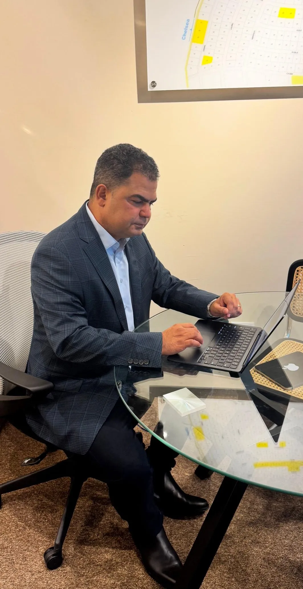 Rafael Gutierrez working at the CYR office